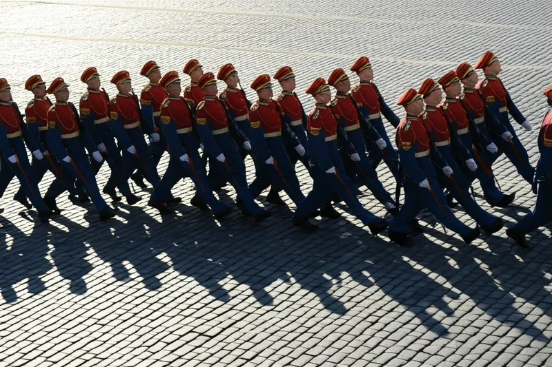 Visual illustration for the word "marched" - To walk with long, regular strides, as a soldier does.