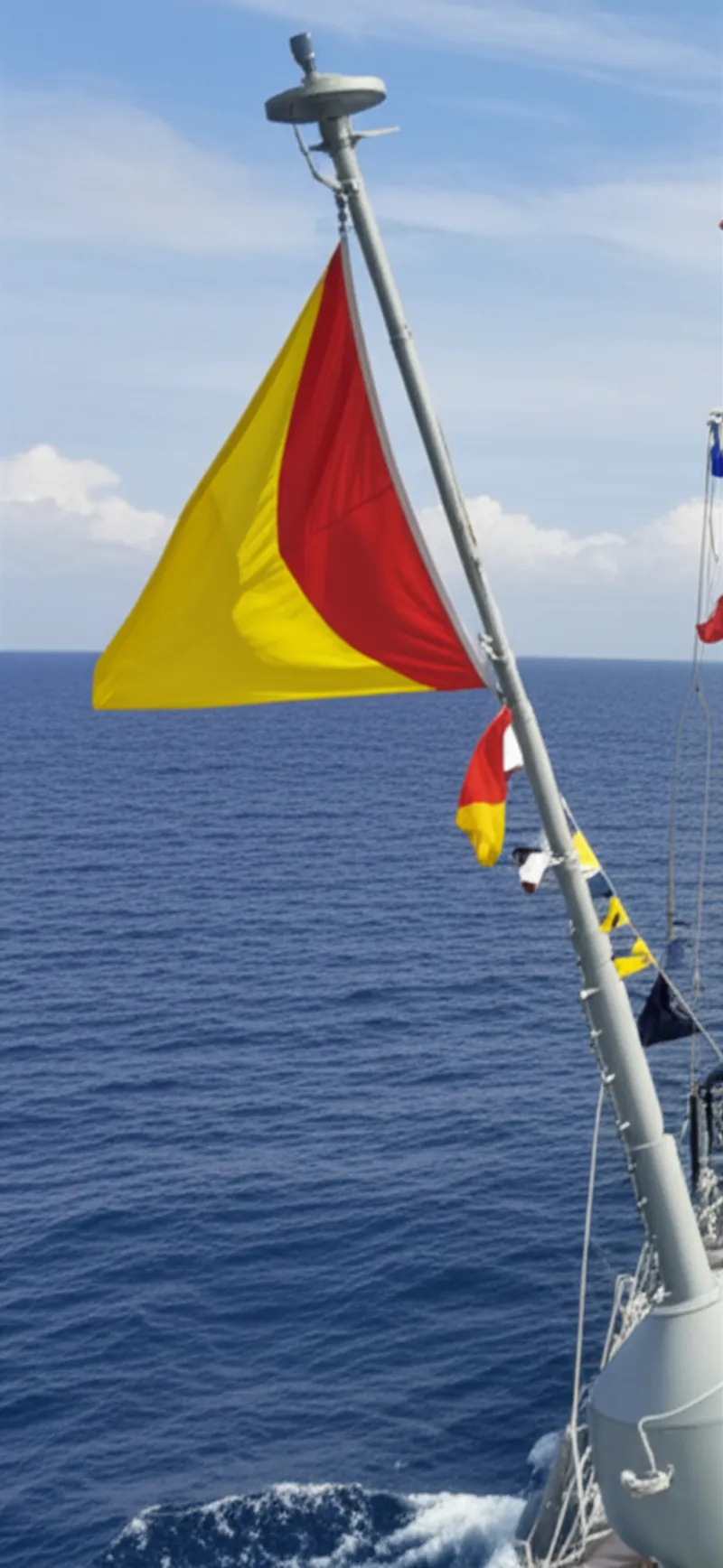 Visual illustration for the word "pennant" - A flag normally used by naval vessels to represent a special condition.