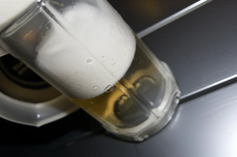 Visual illustration of pot luck: The last draft or portion of an alcoholic beverage in a pot or other drinking vessel. - Image 1