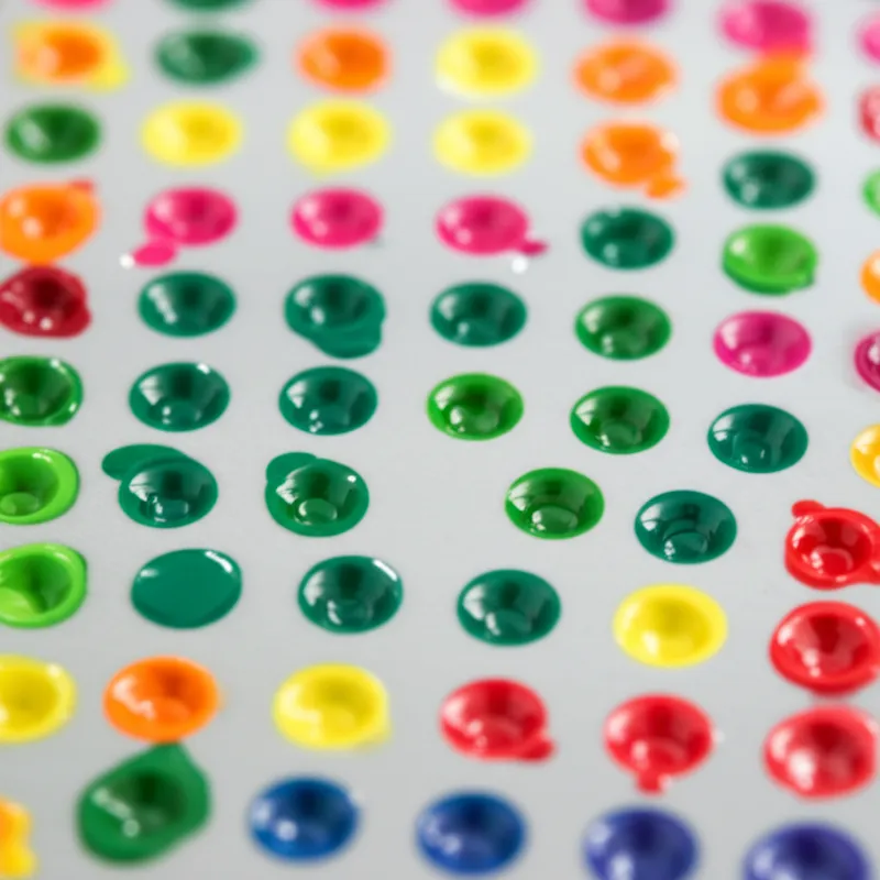 Visual illustration for the word "spanish" - To subject to spanishing, a printing process in which an ink is deposited on the bottoms and sides of depressions formed in a plastic material