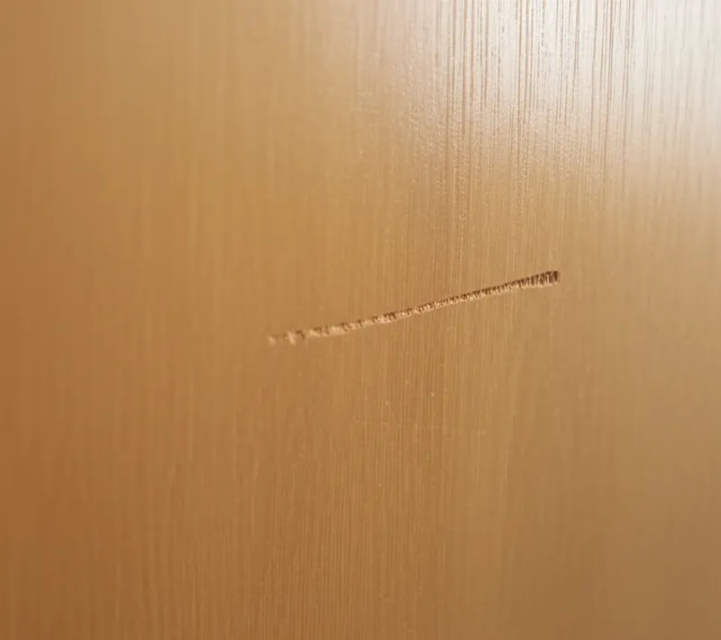 Visual illustration for the word "scratch" - A disruption, mark or shallow cut on a surface made by scratching.